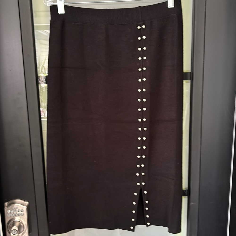 Knit black skirt with silver stud detail